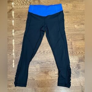 Lululemon🍋 Speed Tight Ruched Black Cropped Leggings W/Bright Blue Waist Size 6